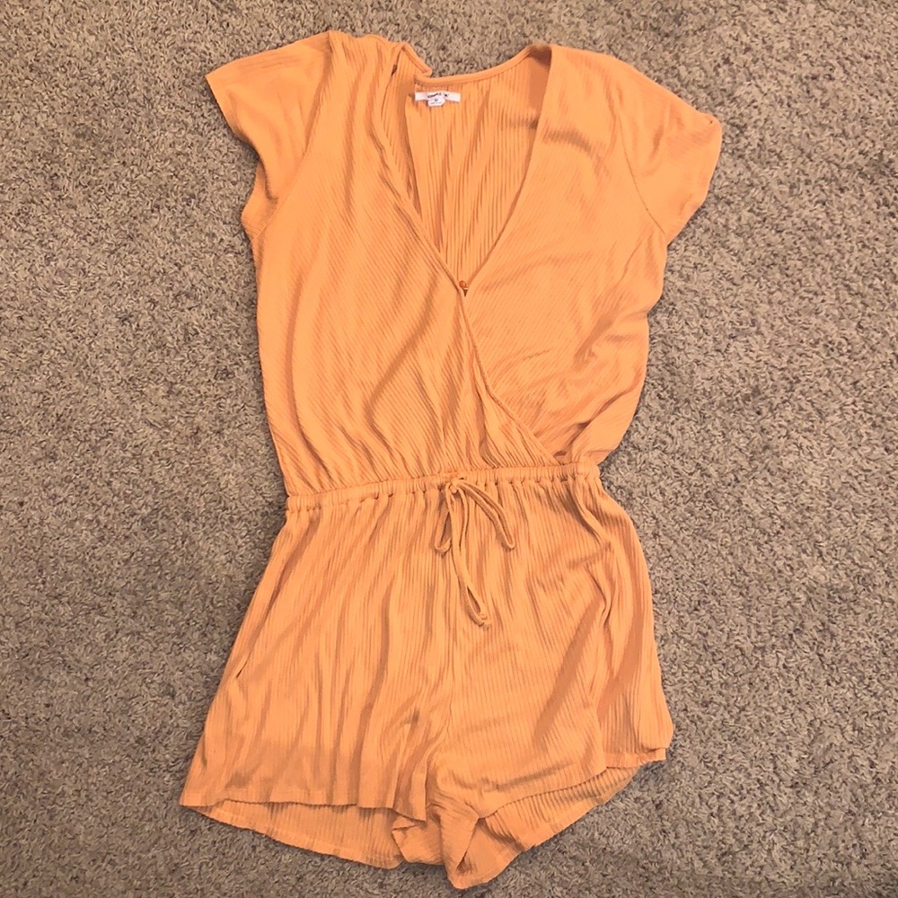 O’Neill romper. Size medium. Orange color
